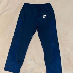 Gymshark blue capris with pockets and mesh, size small.